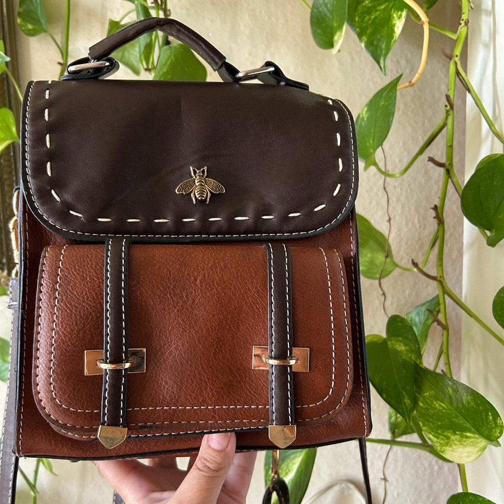 Small Brown Leather Backpack with Bee Emblem - image 1